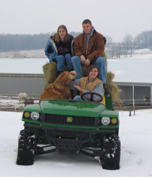 Work at Nature's Edge - image of staff on four wheeler